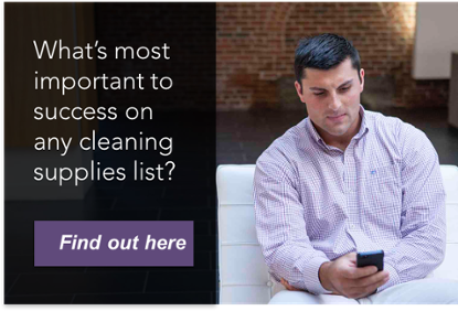 Man checking phone - What's most important to success on any cleaning supplies list